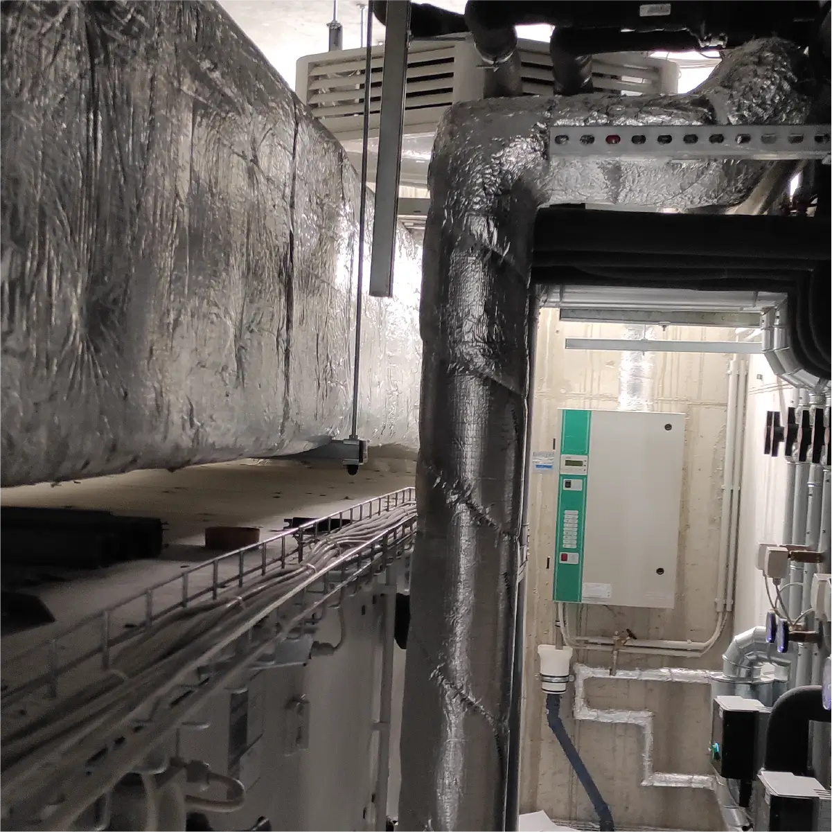 Duct and pipe insulation in a plant room